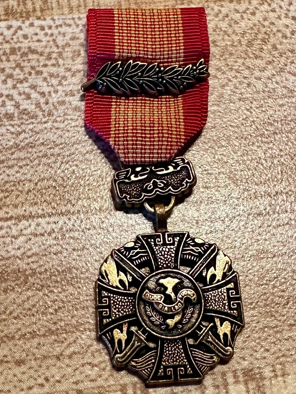 Vietnam Gallantry Cross Medal with a bronze palm device on the ribbon